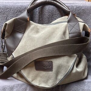Women’s olive and brown large canvas hobo bag.